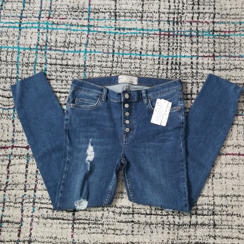 Free people ripped skinny blue jeans